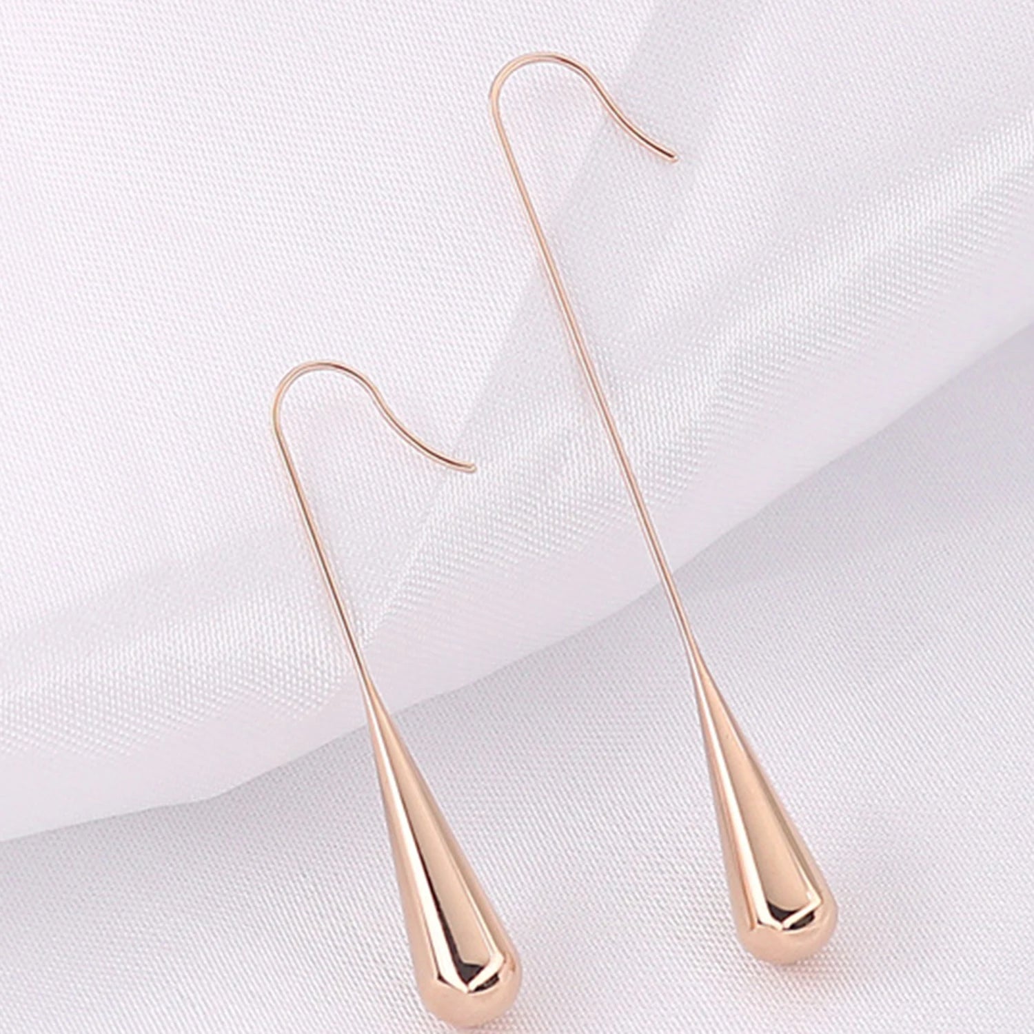 Dospita Fashion Cold Wind Titanium Steel Drop Earrings Smooth Stainless Steel Long Ear Hook Hollow Water Drop Earrings For Women