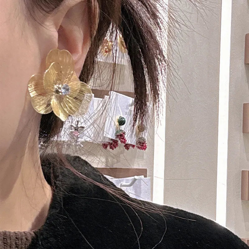 Dospita  -  Fashion Hollow Gold Color Metal Earrings for Women Large Exaggerated Flower Stud Earrings Jewelry Gifts Wholesale