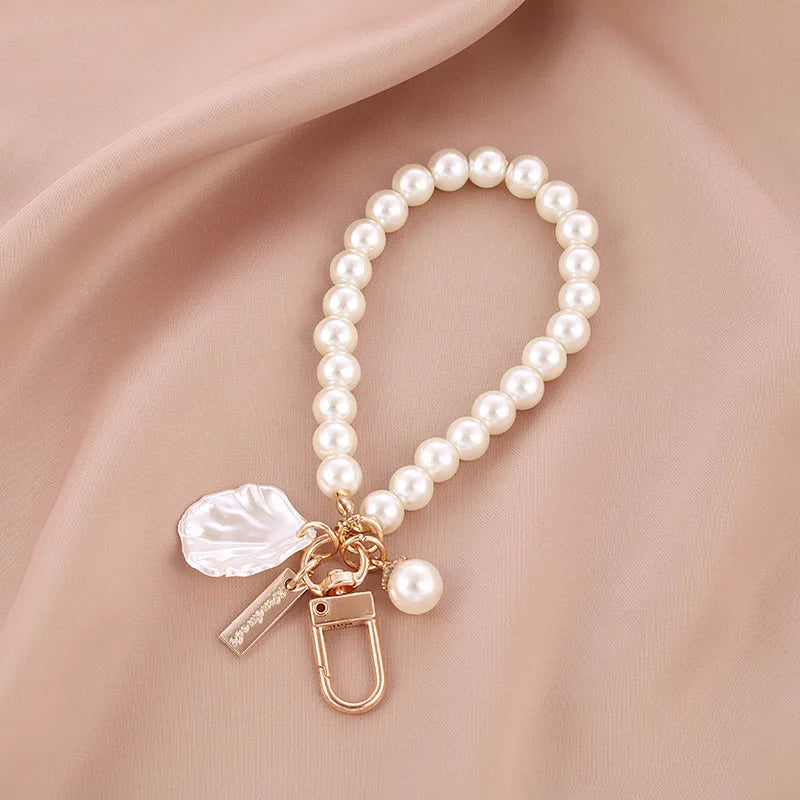 Dospita  -  Pretty Pearl Keychain Luxury Women Jewelry Pearl Bead Shell Phone Bag Backpack Charm Accessory Car Key Key Chain keyring Pendant