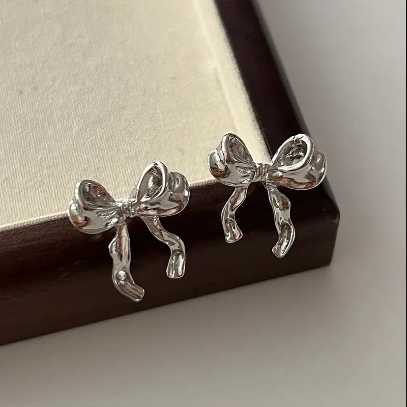 Dospita  -  Design Sweet and Cool Style Bow Knot Stud Earrings Women's Simple Elegant Metal Jewelry Gifts Dropshipping