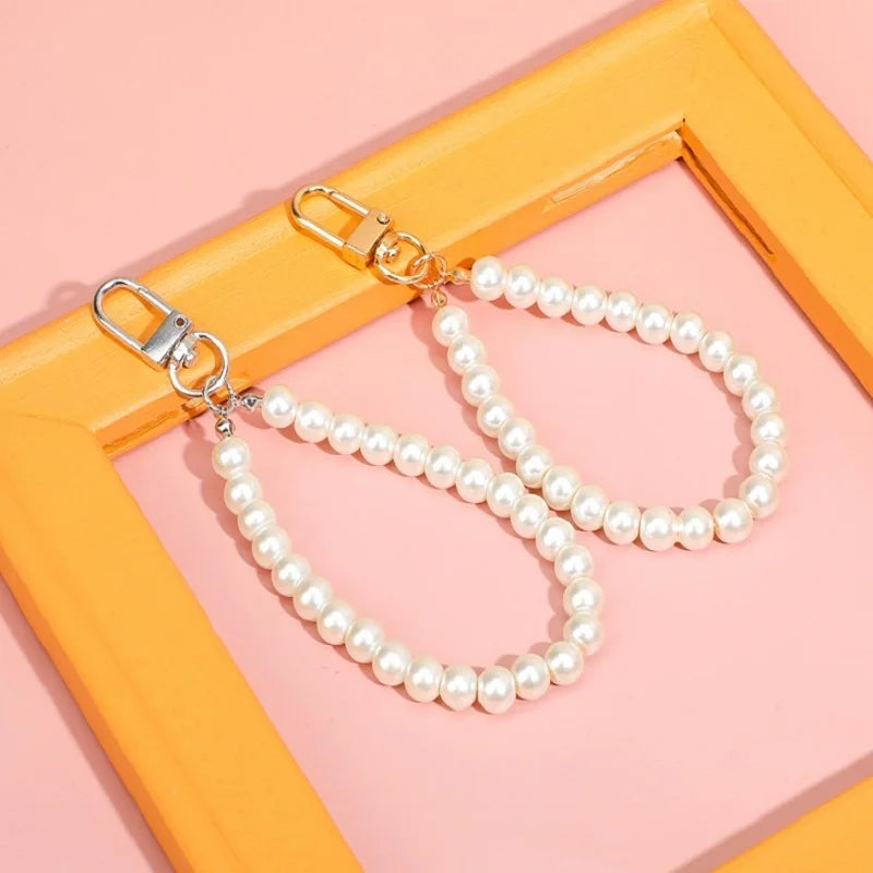 Dospita  -  Pretty Pearl Keychain Luxury Women Jewelry Pearl Bead Shell Phone Bag Backpack Charm Accessory Car Key Key Chain keyring Pendant