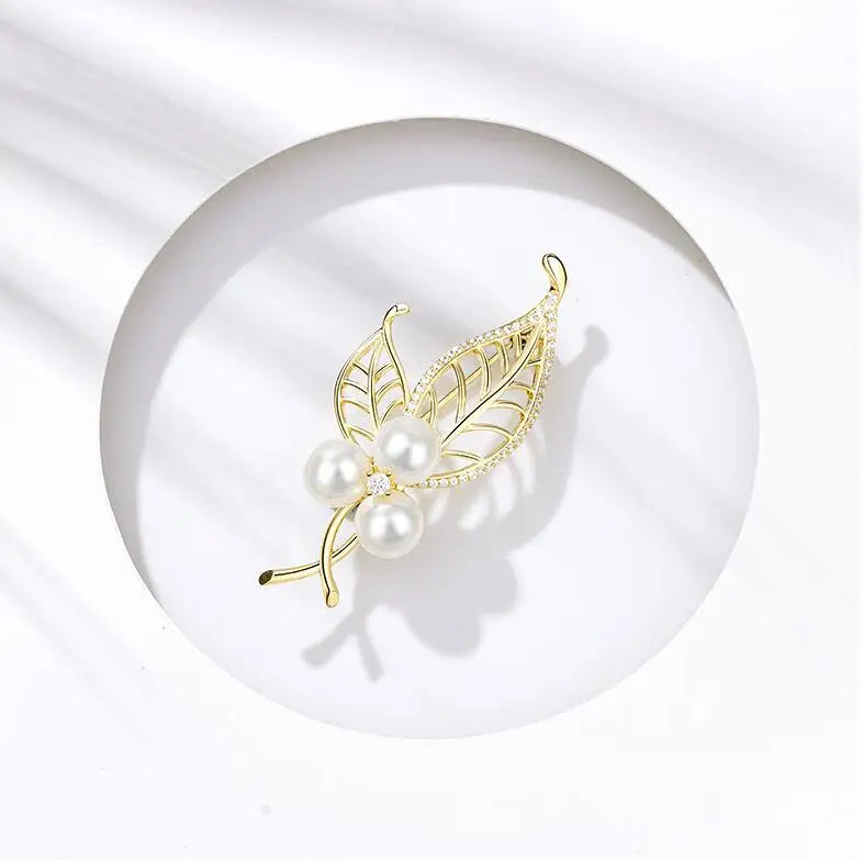 Dospita Fashion pearl leaf brooches temperament personality crystal plant flower pins For Women  clothing coat sweater accessories