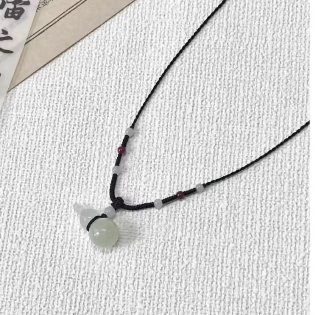 Dospita  -  Peace Buckle Pendant Necklace Hollow Jade Charms Necklace Chinese Style Clavicle Chain Leather Rope Sweater Necklace