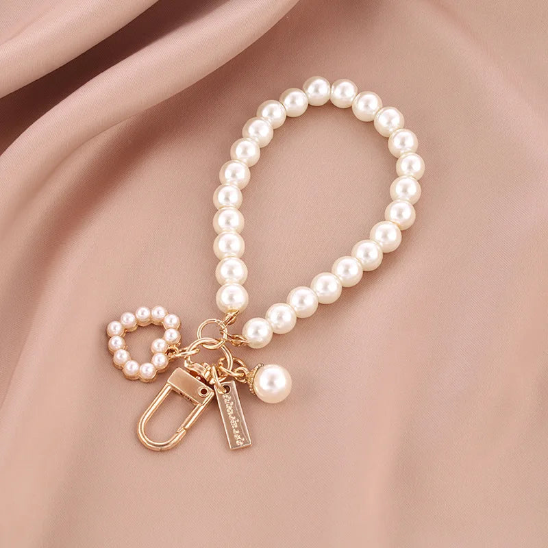 Dospita  -  Pretty Pearl Keychain Luxury Women Jewelry Pearl Bead Shell Phone Bag Backpack Charm Accessory Car Key Key Chain keyring Pendant