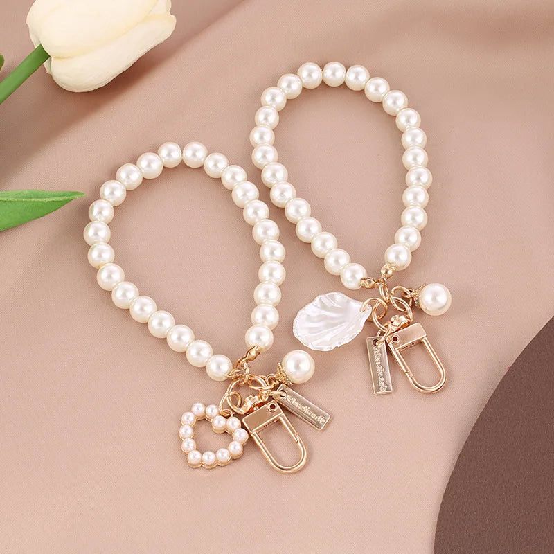 Dospita  -  Pretty Pearl Keychain Luxury Women Jewelry Pearl Bead Shell Phone Bag Backpack Charm Accessory Car Key Key Chain keyring Pendant