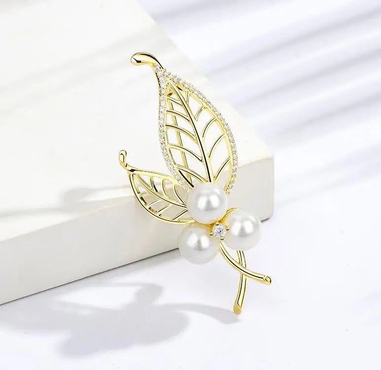 Dospita Fashion pearl leaf brooches temperament personality crystal plant flower pins For Women  clothing coat sweater accessories